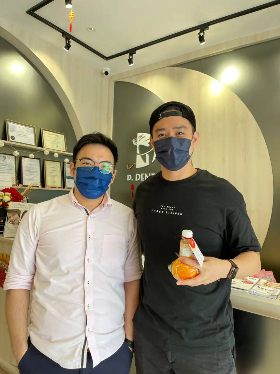 Alex Hii with Dr. Leandre at the D. Dentist clinic